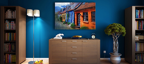Room with book shelves and blue walls