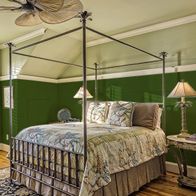 Light and dark green bedroom