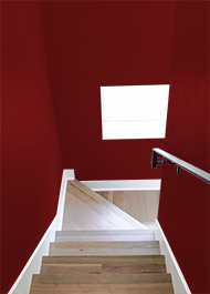Stairway with deep red walls