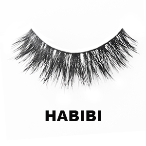Dramatic lash called Habibi. Black band of decent volume flared black lashes even in length, with slight flare.
