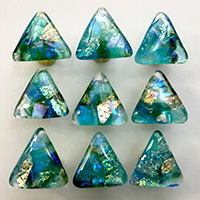 Picture of nine teal bluegreen glass triangles.