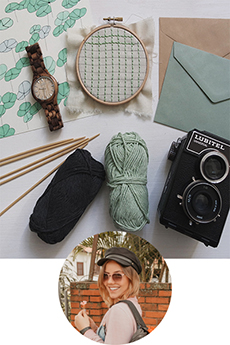 crafts behind young girl in sunglasses smiling