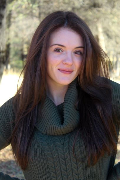 Picture of Jessica wearing a green sweater