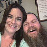 Image of man and woman smiling
