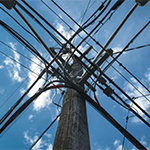 A photo of power lines against a sky background