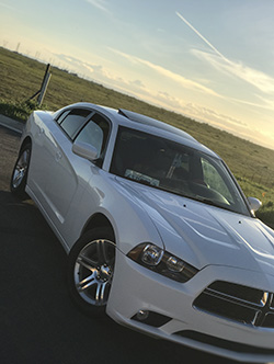 Picture of car in sunset