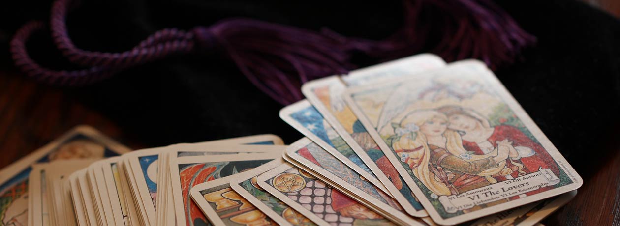  tarot cards splayed out on a table
