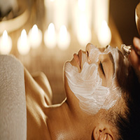 woman with clay mask