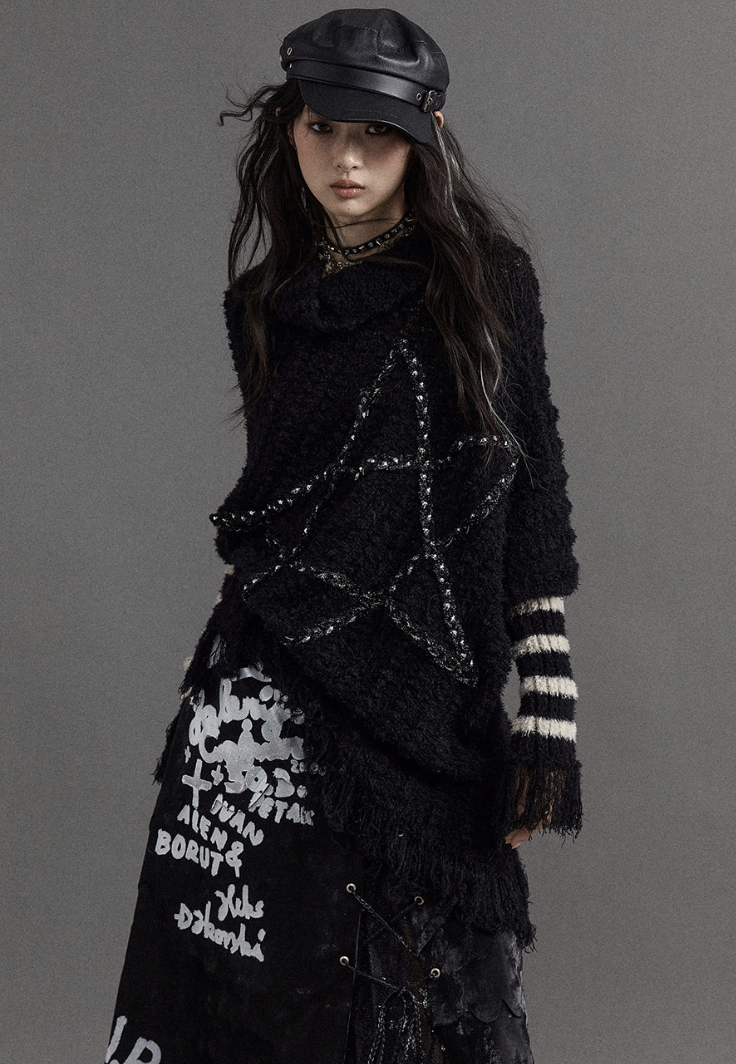 woman wearing a knit sweater with a large star