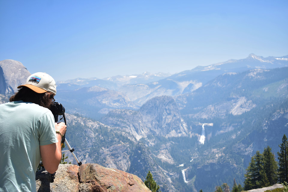 photographer point camera over Yosemite Valley