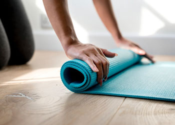 rolling yoga mat out