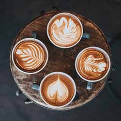 Four cups of coffee in a circle